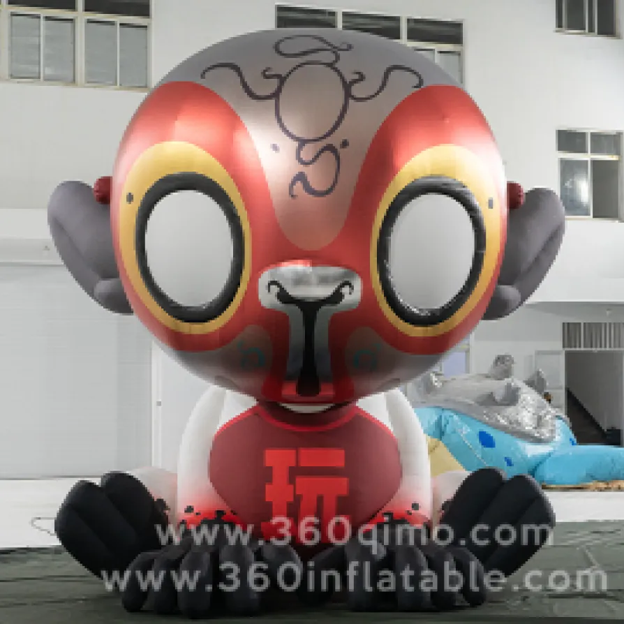 5m high IP licensed monkey inflatable with red face paint and sitting pose in factory hall