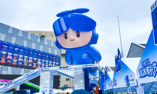 Giant IP mascot inflatable installation at outdoor plaza